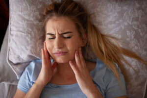 Bruxism or teeth grinding in sleep, neuromuscular therapy 